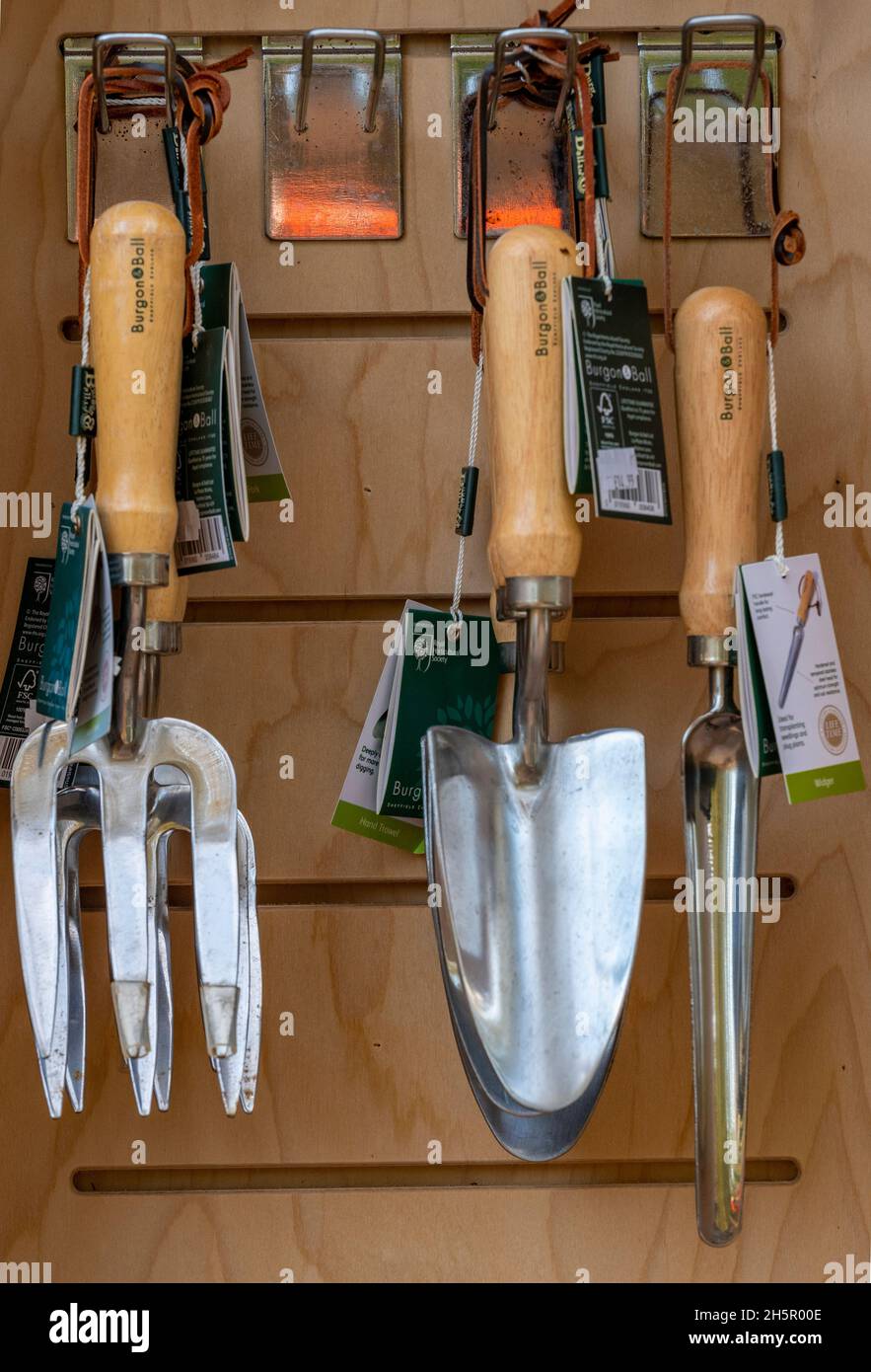 selection of gardeners hand tools including spade and fork for digging