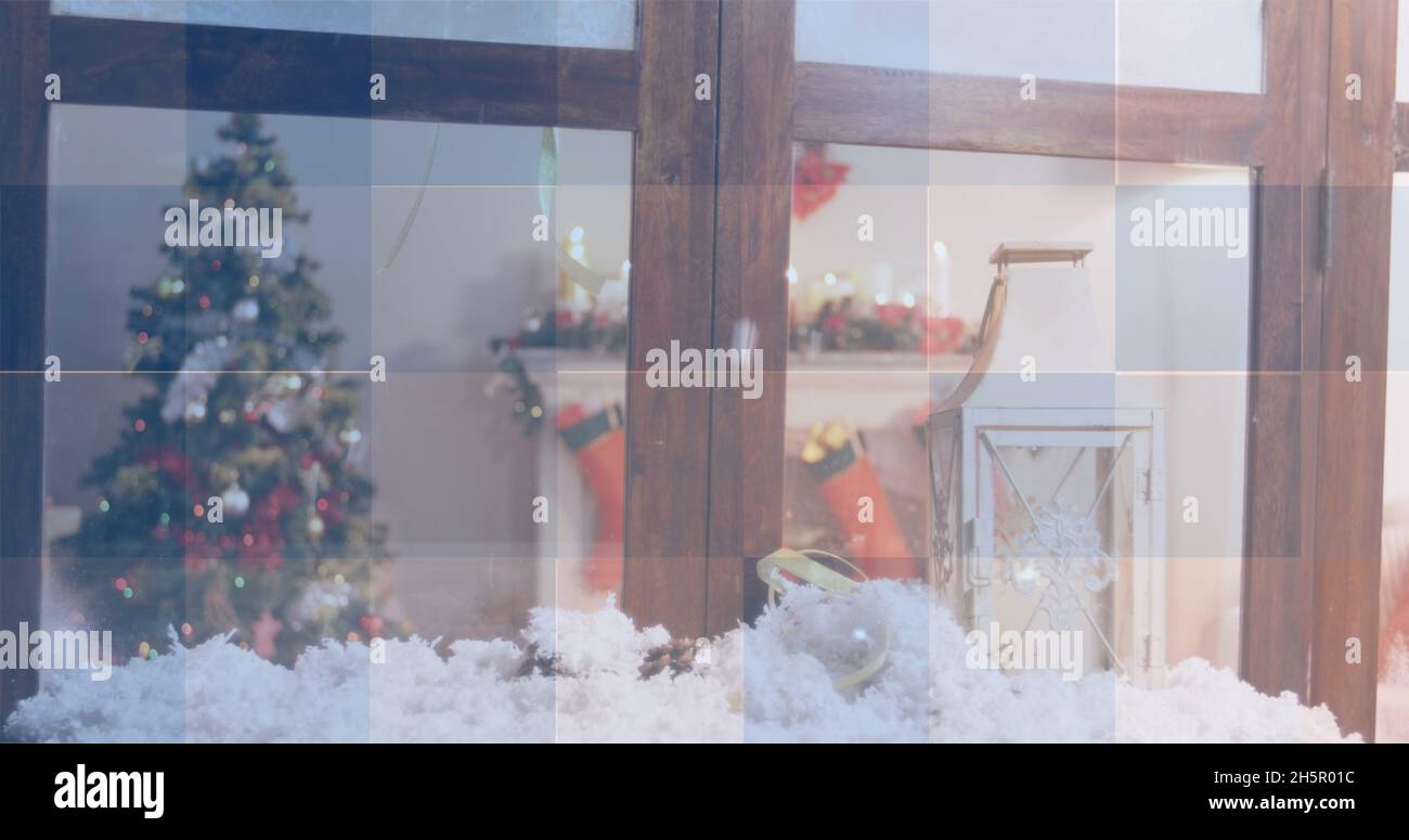 Image of squares in red, white and blue of flag of america, over christmas tree and decorations Stock Photo