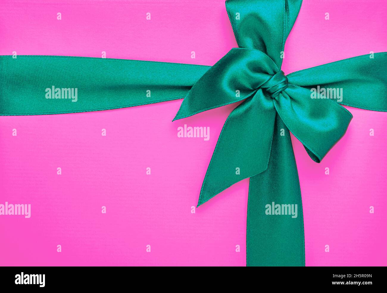 Pink package green ribbon hi-res stock photography and images - Alamy