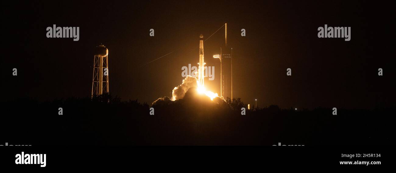 CAPE CANAVERAL, FL, USA - 10 November 2021 - A SpaceX Falcon 9 rocket carrying the company's Crew Dragon spacecraft is launched on NASA’s SpaceX Crew- Stock Photo