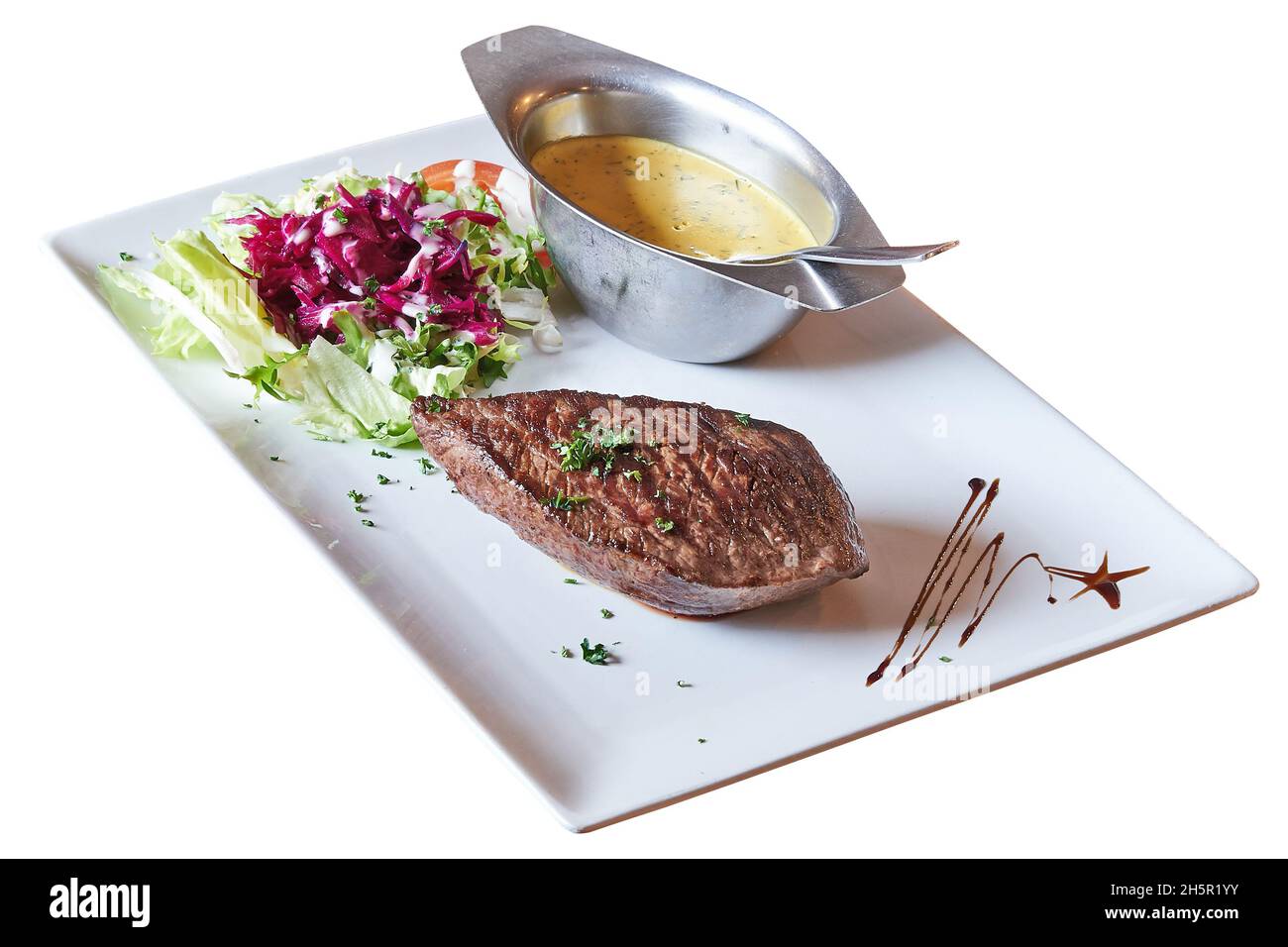 Well done Beef steack with sauce and lettuce isolated on white with clipping path Stock Photo