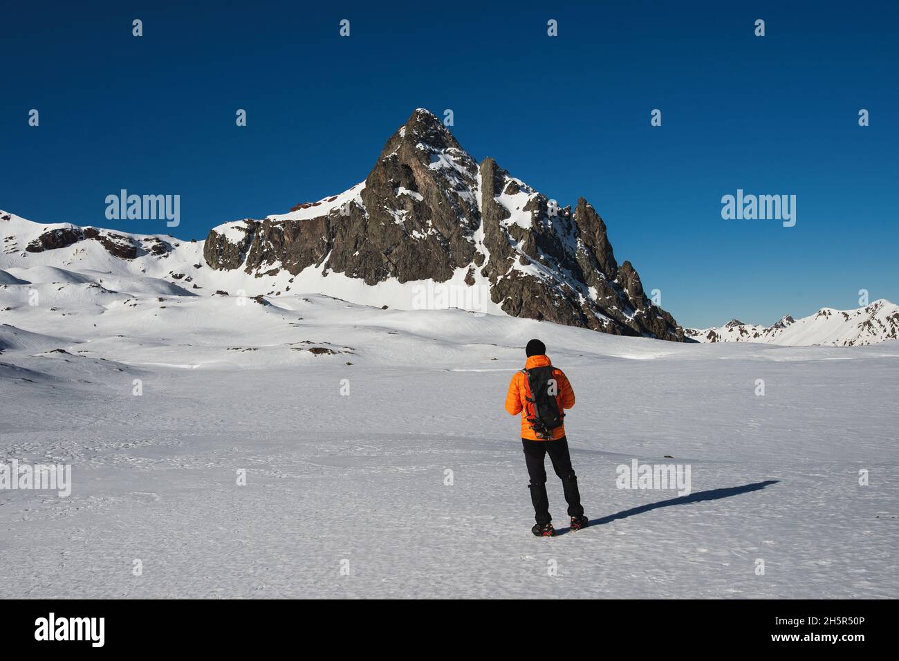 A man in the snowy mountains Stock Photo