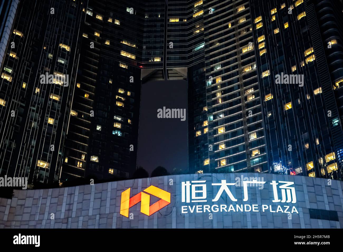Chengdu, Sichuan province, China - Oct 28, 2021 : Evergrande Plaza commercial mall and skyscraper illuminated at night Stock Photo