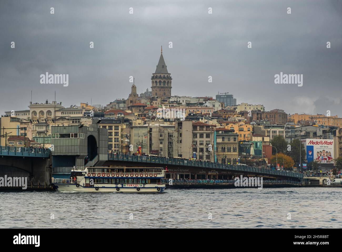 Istanbul, Turkey-Nov.9, 2021: Eminönü and Karaköy districts are the most visited areas of the city by tourists.Tourists and local people walk and shop Stock Photo