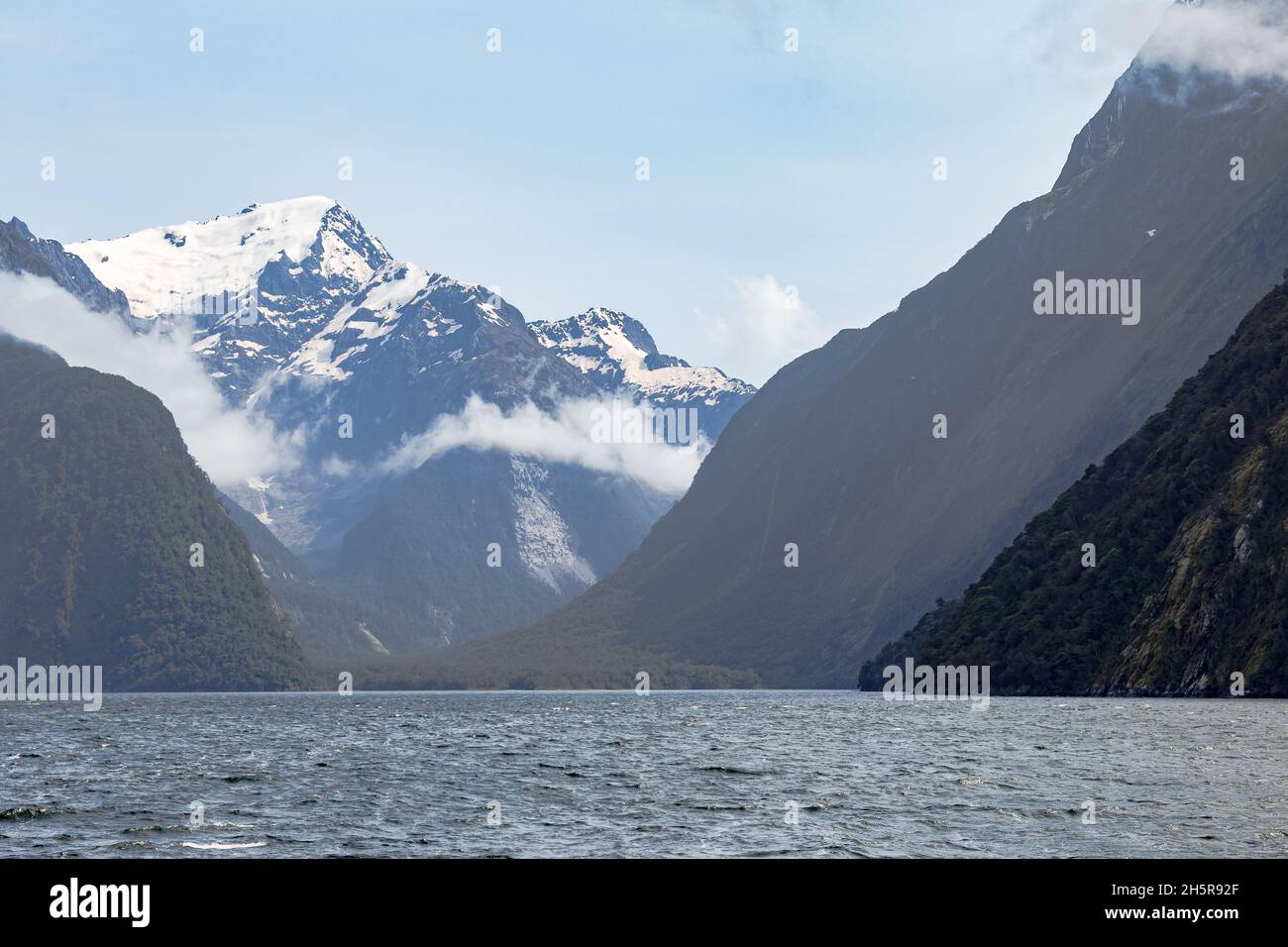 Cloudy day in the fjords of the South Island. New Zealand Stock Photo ...