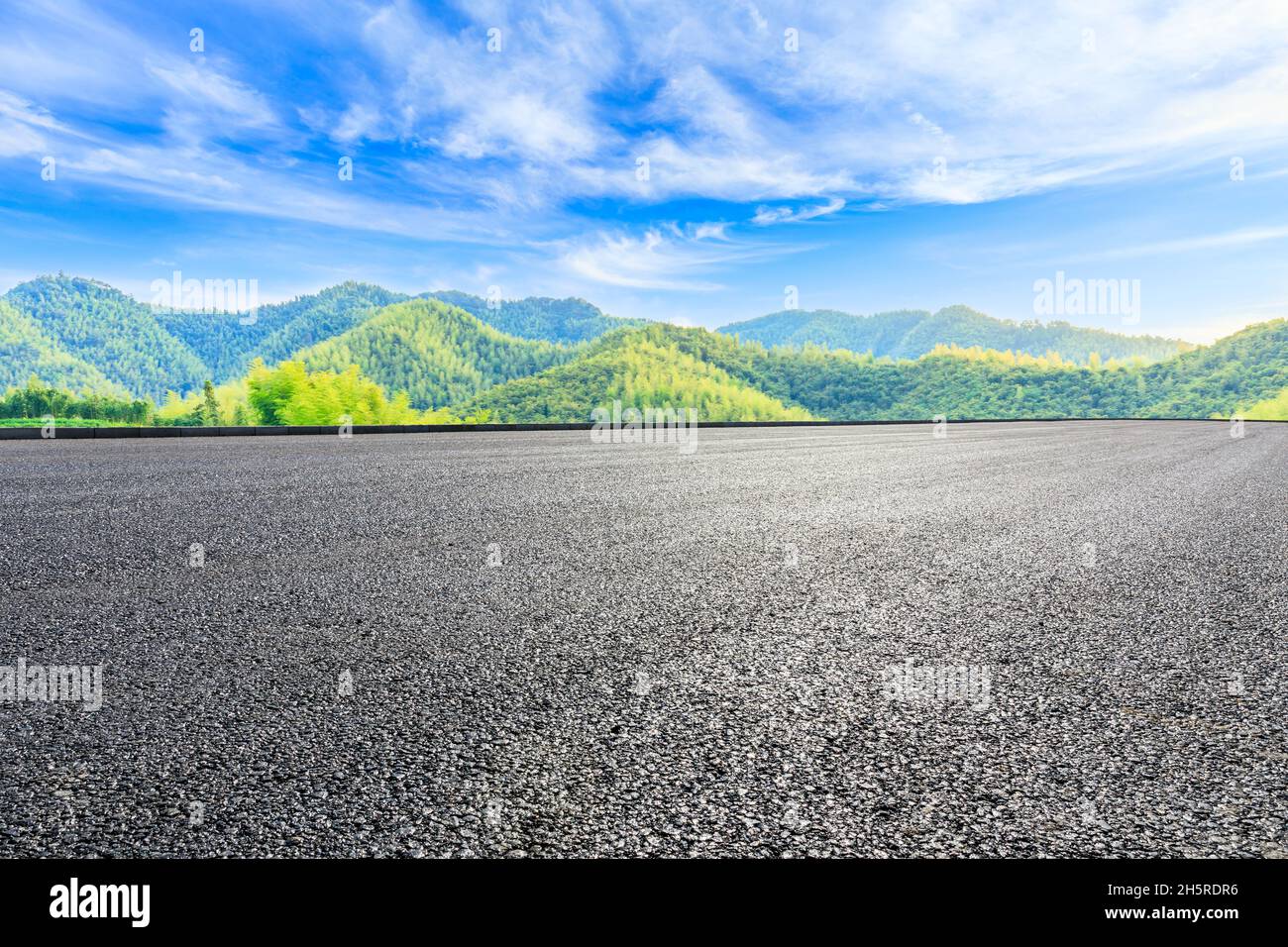 Asphalt Road And Green Mountain With Bamboo Forest Natural Landscape 