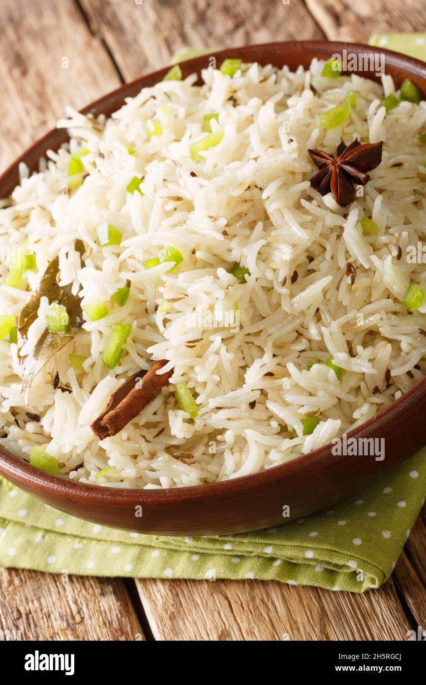 Perfect Jeera Rice Indian Cumin Rice close up in the bowl on the table