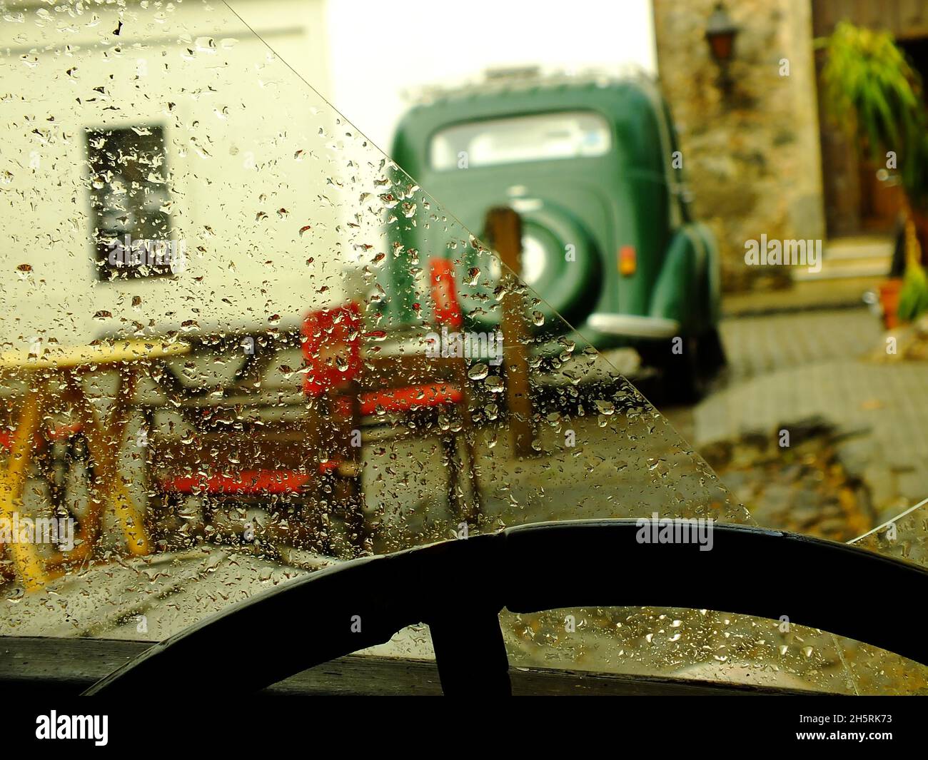 Through the car window on a rainy day Stock Photo - Alamy