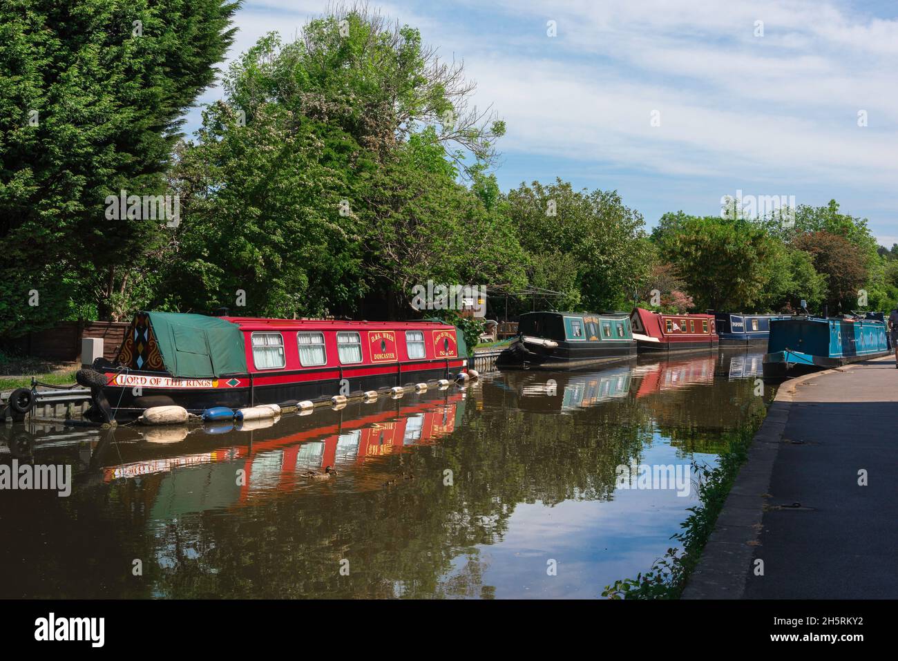 Narrow boats, view in summer of narrow boats moored in the Leeds And Liverpool Canal in the centre of Skipton, North Yorkshire, England, UK Stock Photo