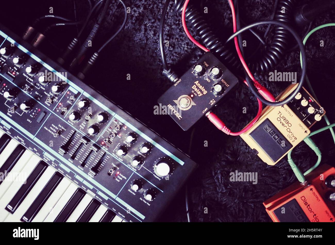 PARIS, FRANCE - Dec 16, 2016: Analog Synthesizer and Effects Pedals for Electronic Music Stock Photo
