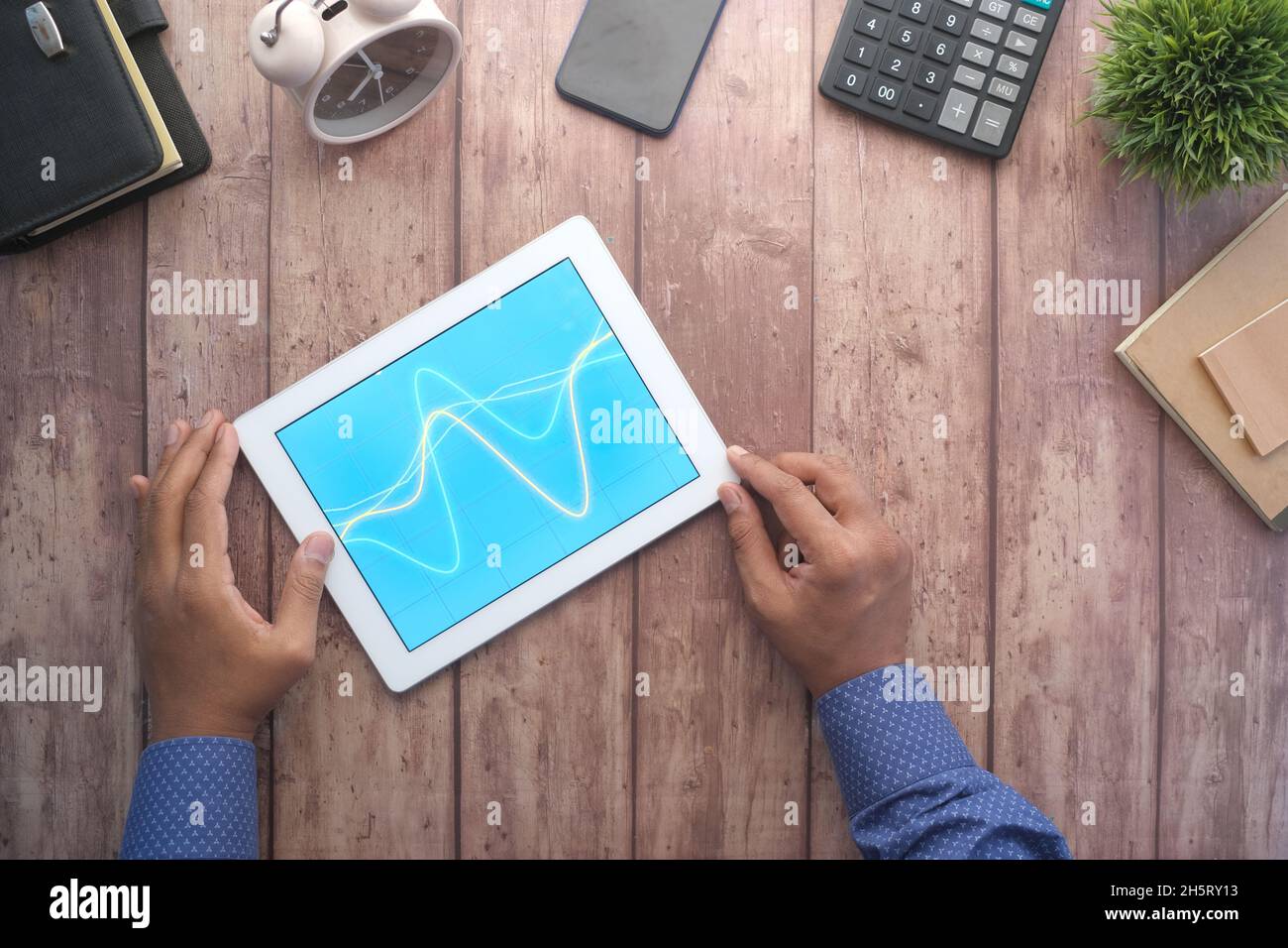 analyzing stock market data on digital tablet  Stock Photo