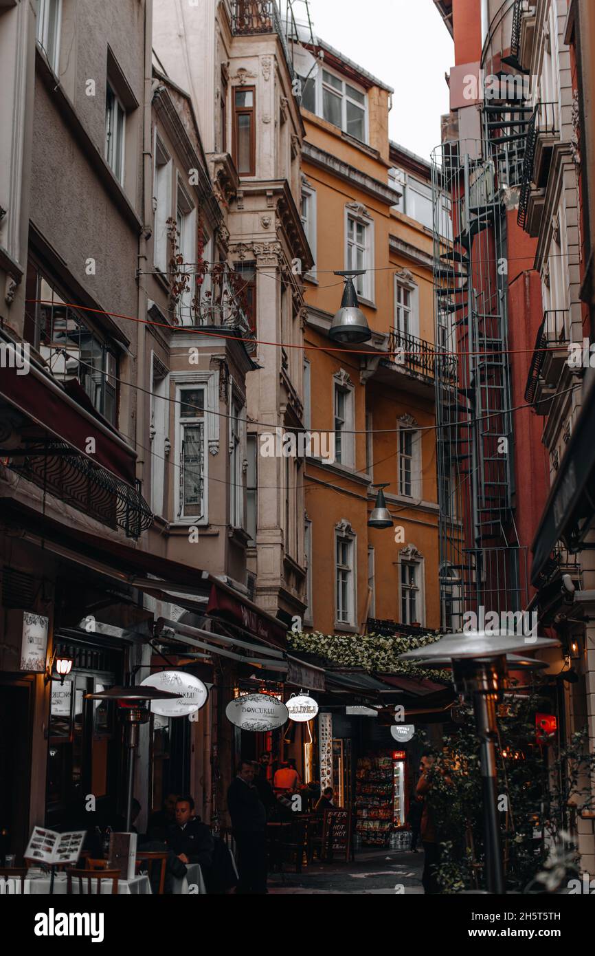 Historic vintage cozy streets with cafes of Istanbul city Stock Photo