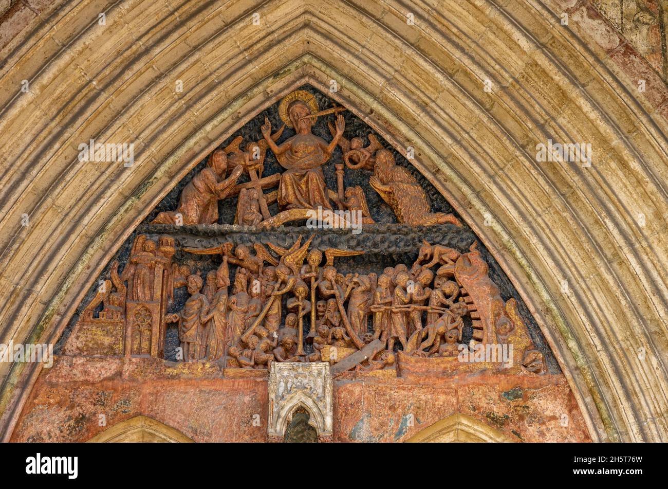 Ulm, Baden-Württemberg, Germany: Tympanum of the Judgment Portal with a late Gothic depiction of the Last Judgement, a side portal of the Minster. Stock Photo