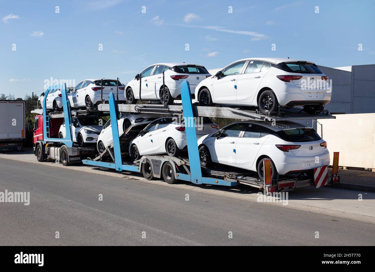 Galicia, Spain; november 7, 2021: Truck loaded with cars parked in an industrial estate. Car transporter Stock Photo