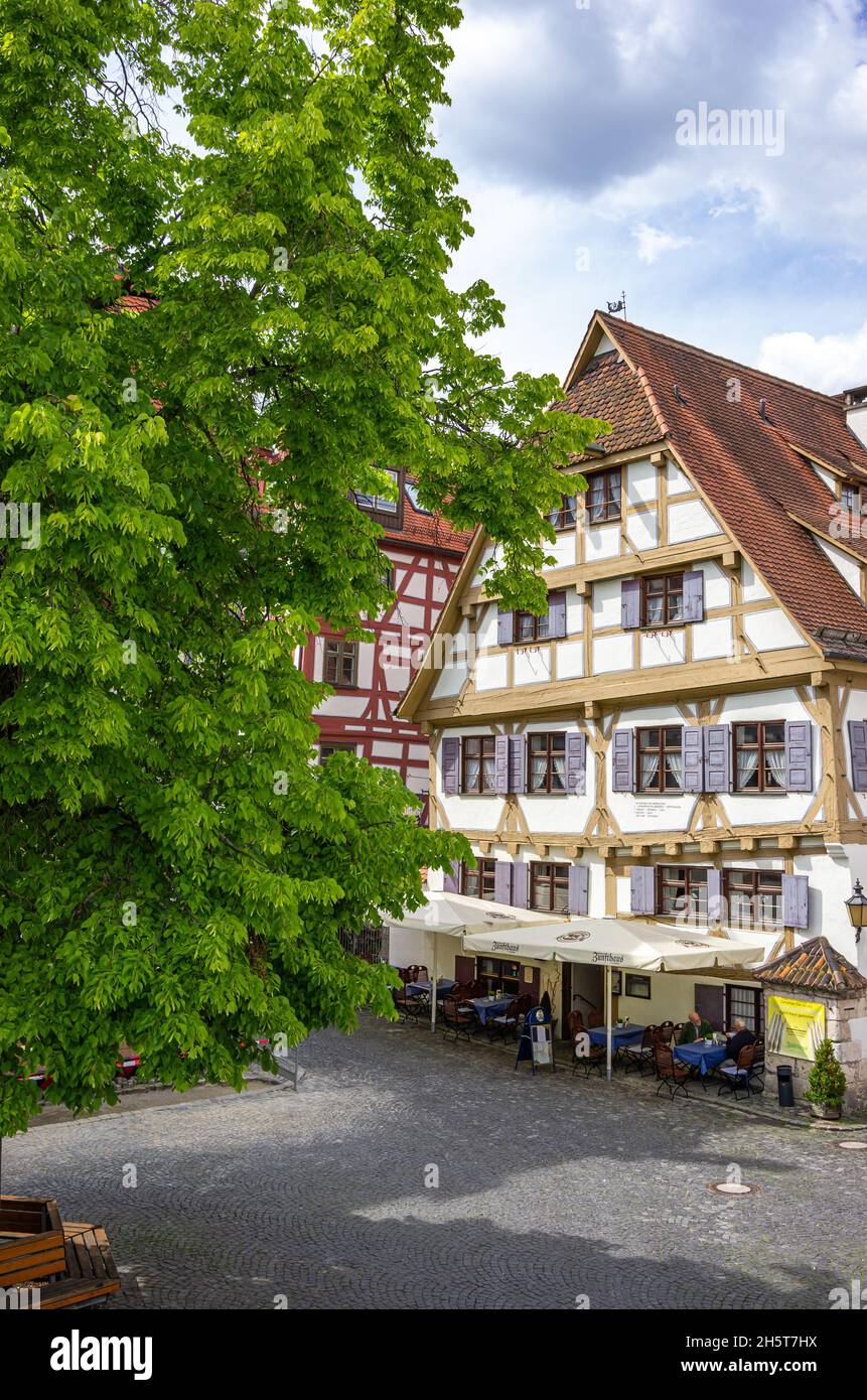 On the way in the fishermen's quarter of Ulm, Baden-Württemberg, Germany: The Guild House of the Shipmen in Fischergasse, nowadays a popular inn. Stock Photo