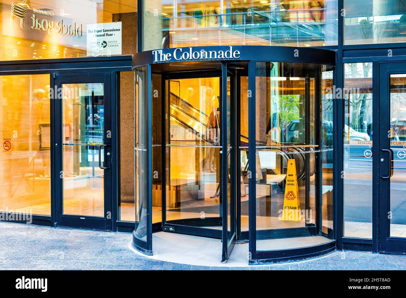 Revolving entrance door to The Colonnade business in the downtown district of Toronto, Canada. Nov. 10, 2021 Stock Photo