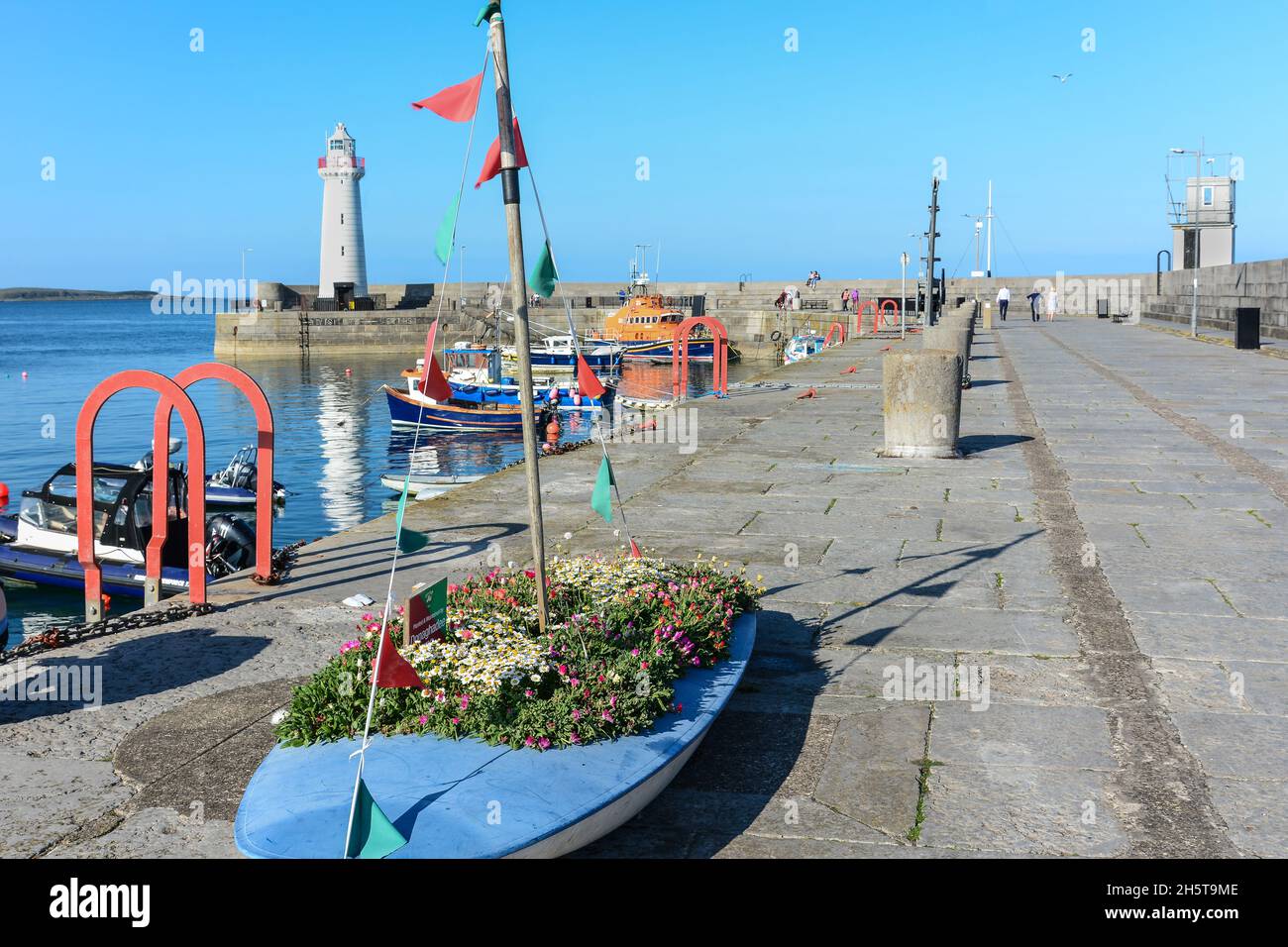 Donaghadee,Northern Ireland,United Kingdom - September 1, 2021: The Donaghadee lighthouse view from the pier Stock Photo
