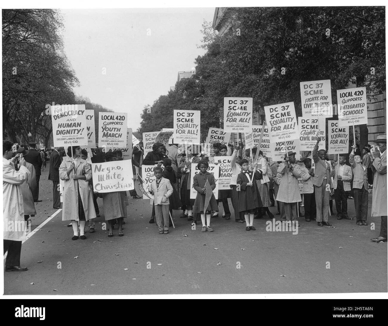 Photograph of African-American children and parents demonstrating at the Lincoln Memorial Youth March for Integrated Schools, Washington, DC, 10/25/1958. Photo by National Park Service Stock Photo