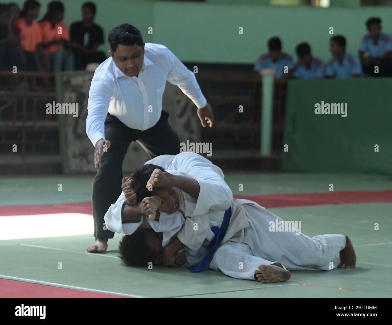 Students of Tripura sports school participate in a Judo competition at