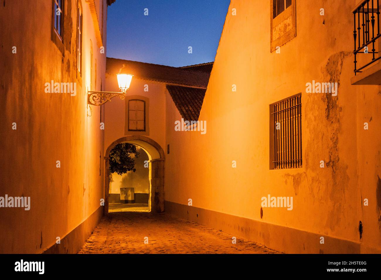 Evening view of a street in the Old Town Cidade Velha of Faro, Portugal. Stock Photo