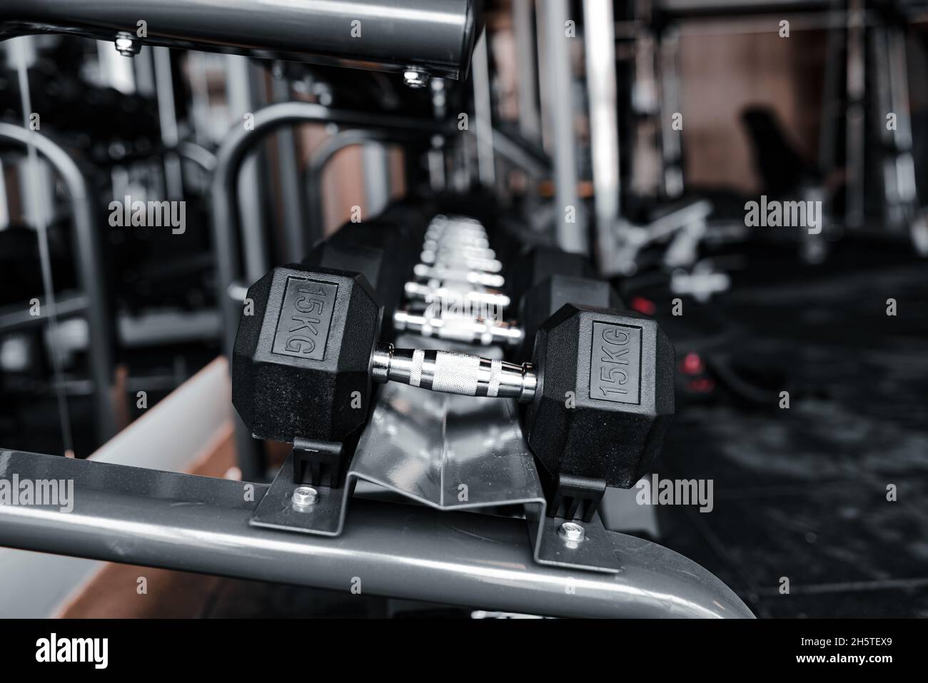 dumbbell on the gym table Stock Photo Alamy