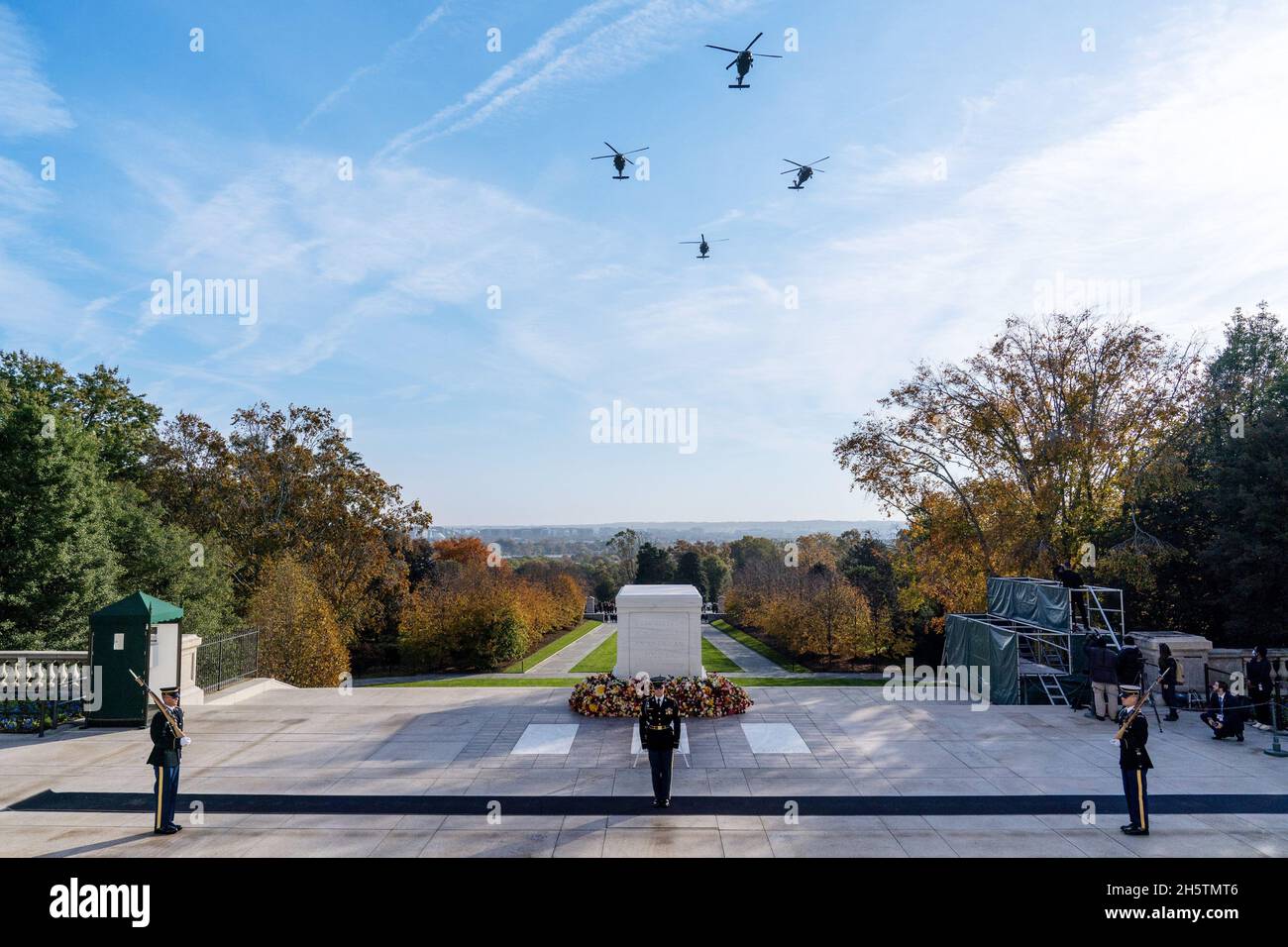 Arlington, USA. 11th Nov, 2021. A formation of U.S. Army UH-60 Blackhawk helicopters fly over during a centennial ceremony for the Tomb of the Unknown Soldier, in Arlington National Cemetery in Arlington, Virginia on Veterans Day, Thursday, November 11, 2021, Pool photo by Alex Brandon/UPI Credit: UPI/Alamy Live News Stock Photo