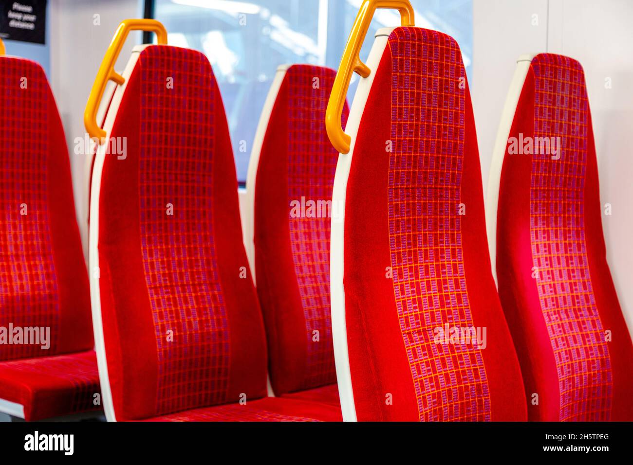 Red seats at a South Western Railway train at Waterloo Station, London, UK Stock Photo