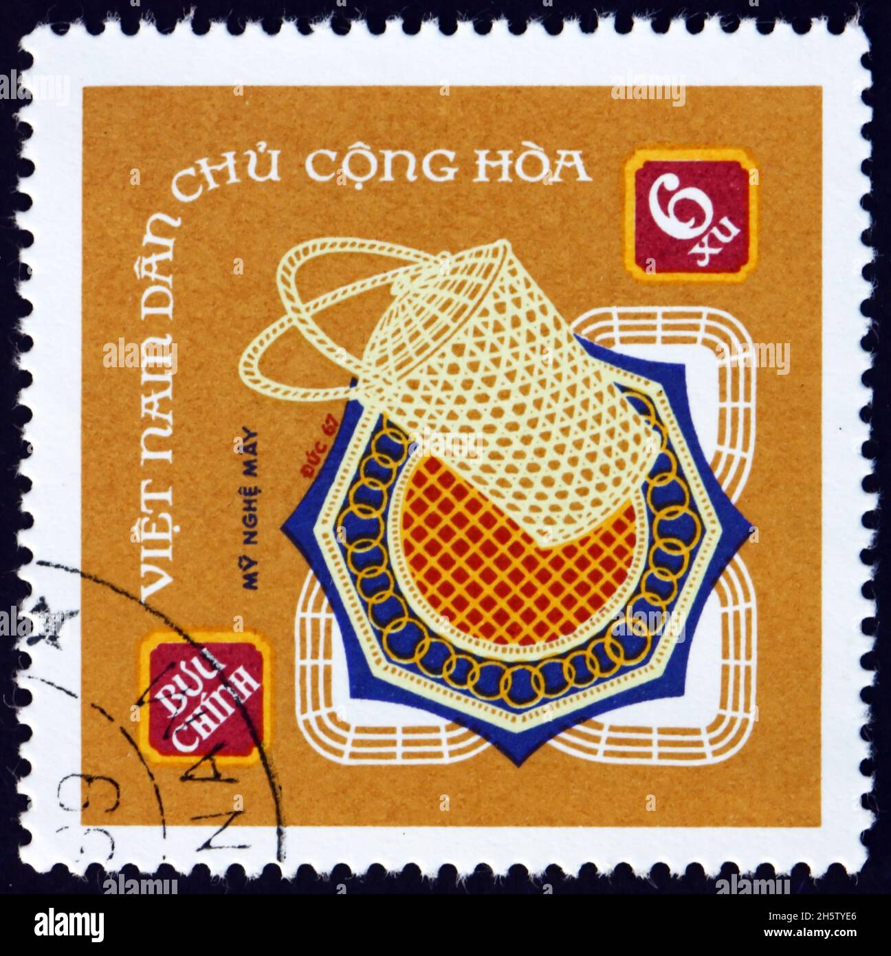 VIETNAM - CIRCA 1968: a stamp printed in Vietnam dedicated to handicrafts shows rattan products, circa 1968 Stock Photo