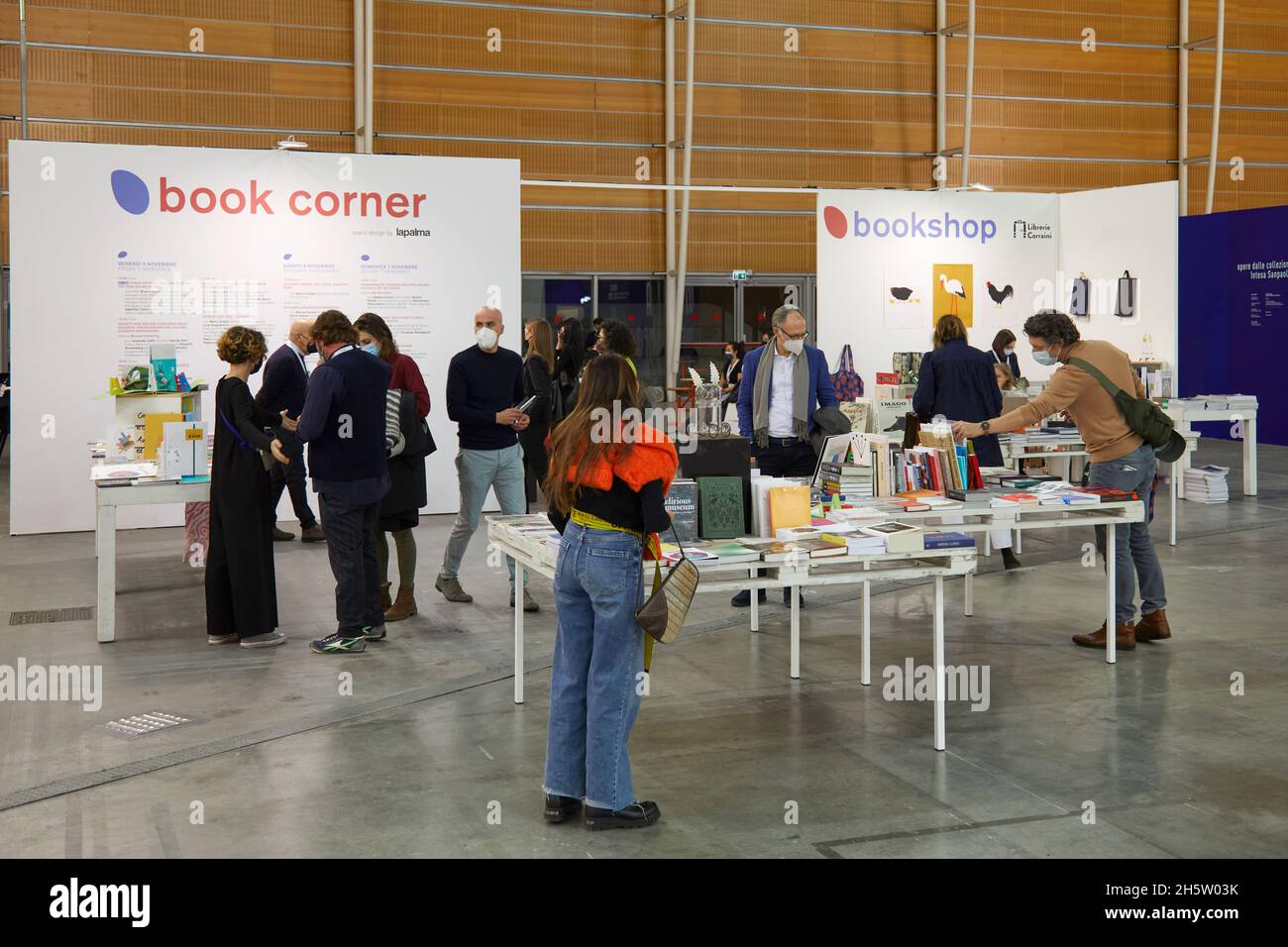 TURIN, ITALY - NOVEMBER 05, 2021: Artissima 2021 bookshop, people and art collectors at contemporary art fair Stock Photo