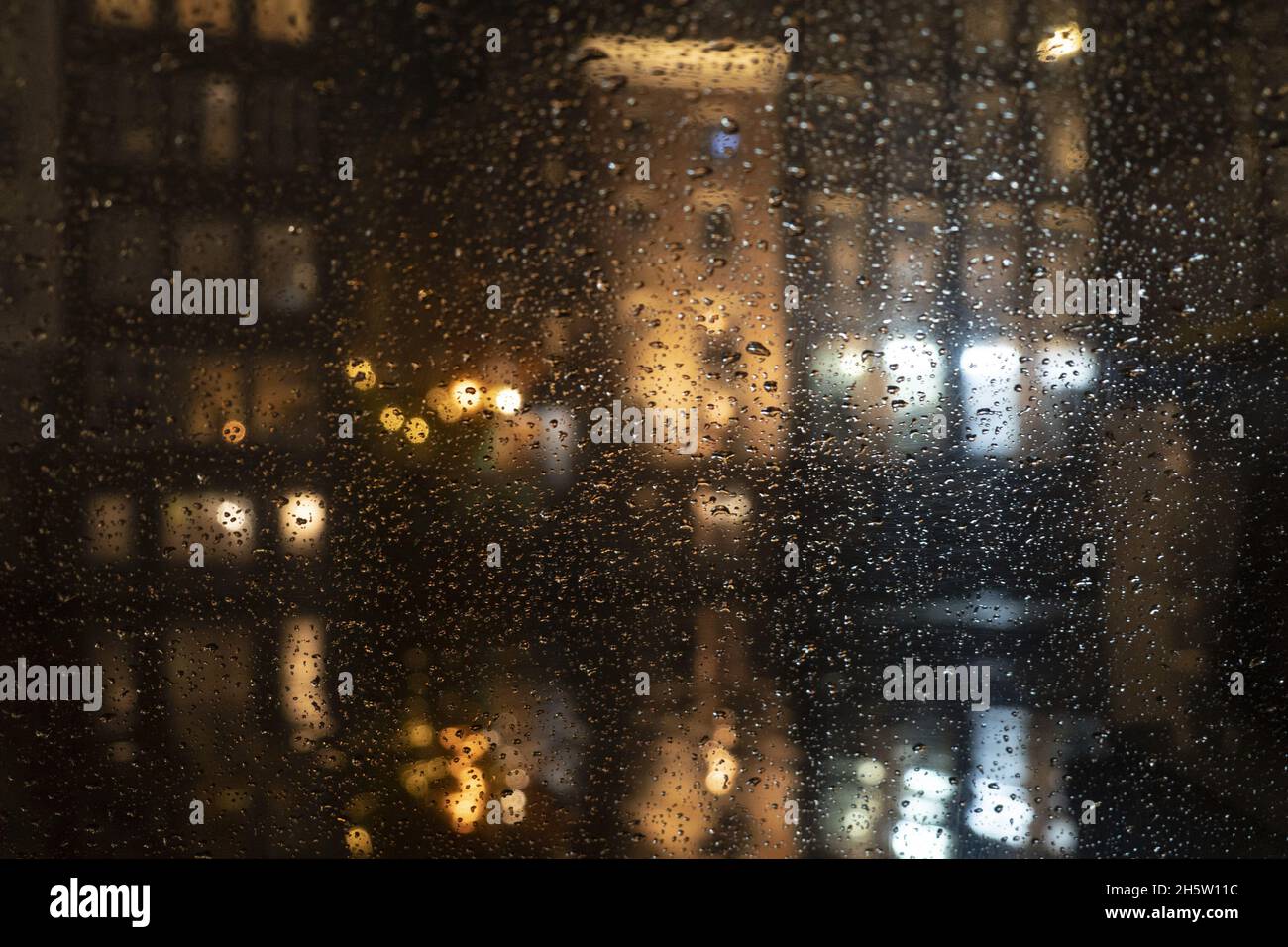 Evening city street rain drops hi-res stock photography and images - Alamy