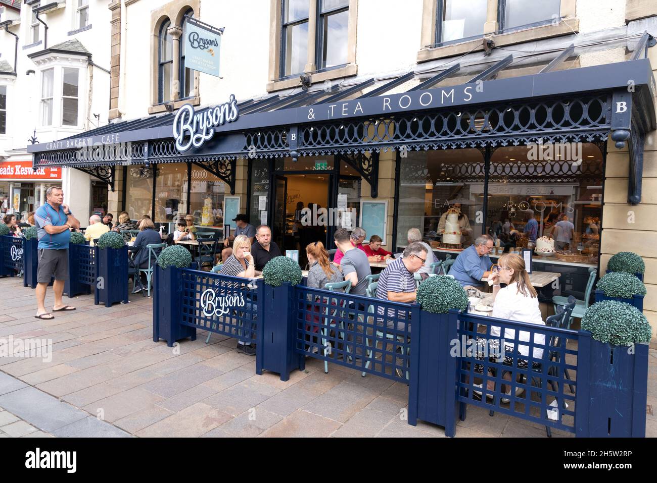 Tea Rooms UK; People sitting outside drinking tea in summer, Brysons