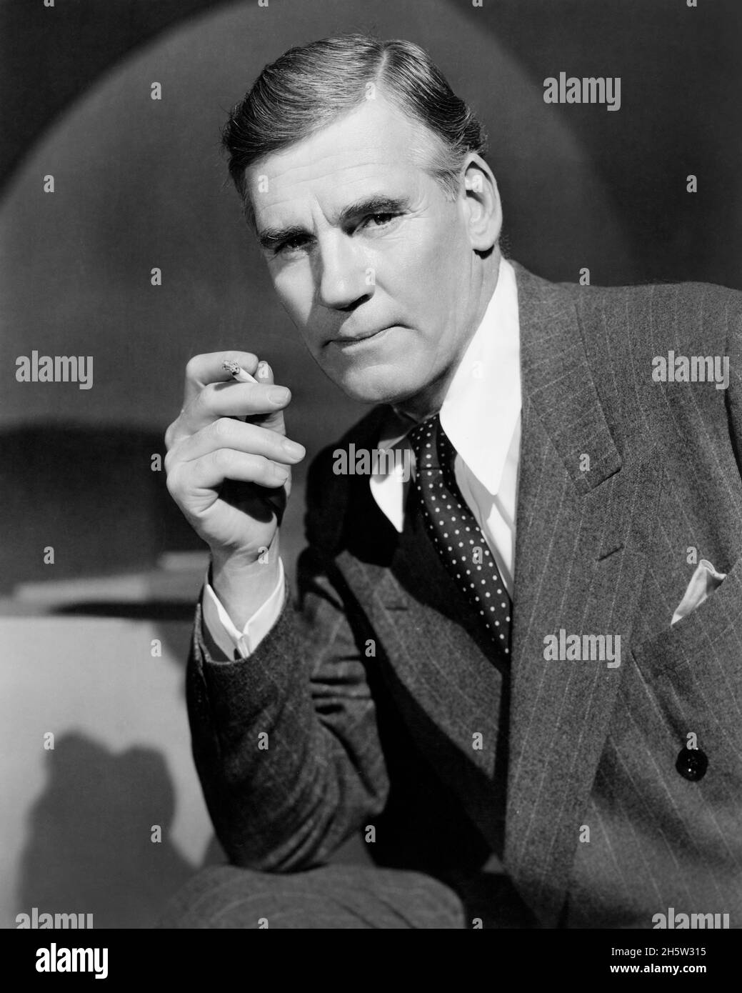 Walter Huston, half-length Publicity Portrait for the Film, 'Mission To Moscow', Warner Bros., 1943 Stock Photo