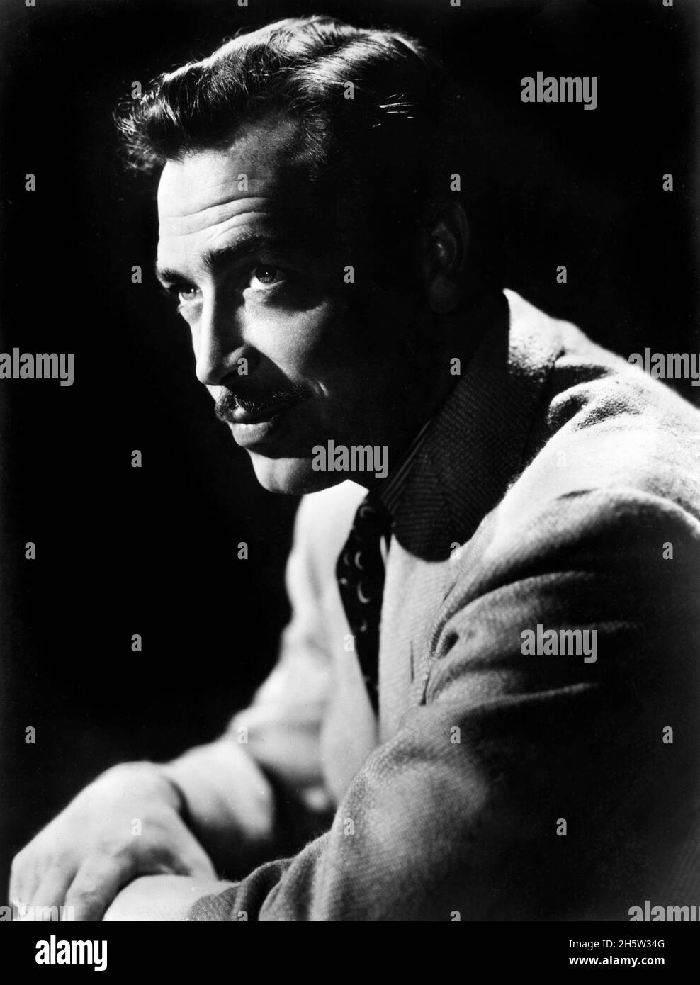 John Howard (1913-1995), American Actor, head and shoulders Publicity Portrait, Unidentified Artist, 1940's Stock Photo
