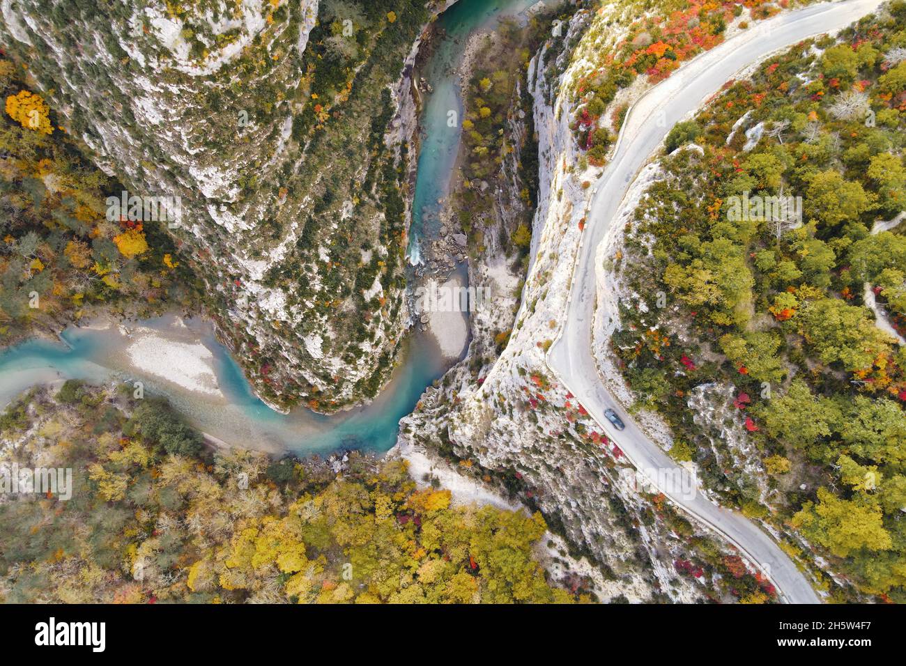 The Verdon Gorge (French: Gorges du Verdon) is a famous river canyon located in the Provence-Alpes-Côte d'Azur region of Southeastern France.Drone vie Stock Photo