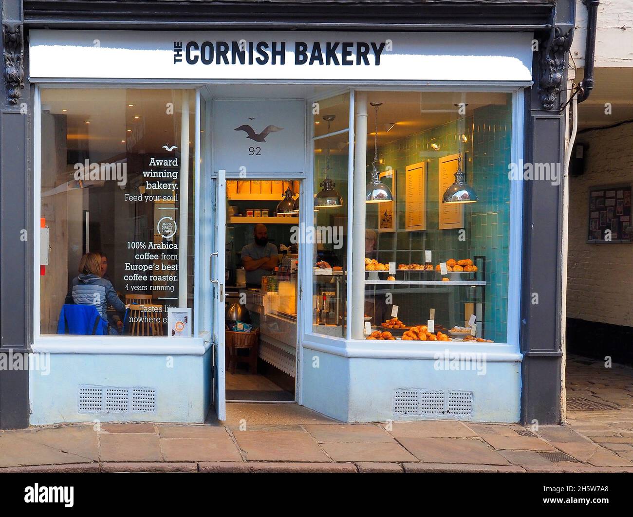 The Cornish Bakery selling specialist  Cornish food and coffee in Church Street  Whitby Stock Photo