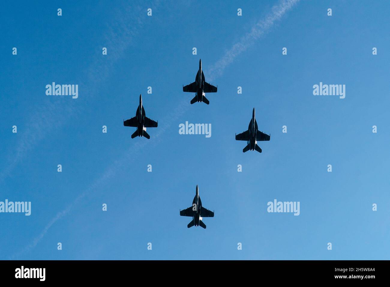 Arlington, Virginia. 11th Nov, 2021. A formation of United States Navy F/A-18 Hornets fly over during a centennial ceremony for the Tomb of the Unknown Soldier, in Arlington National Cemetery, on Veterans Day, Thursday, Nov. 11, 2021, in Arlington, Virginia. Credit: Alex Brandon/Pool via CNP/dpa/Alamy Live News Stock Photo