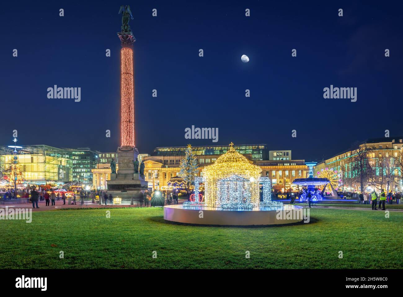 Christmas Market at Schlossplatz at night - Stuttgart, Baden-Wurttemberg, Germany Stock Photo