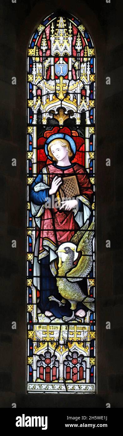 A stained glass window depicting Saint John, St Mary & the Holy Cross, Alderminster, Warwickshire Stock Photo