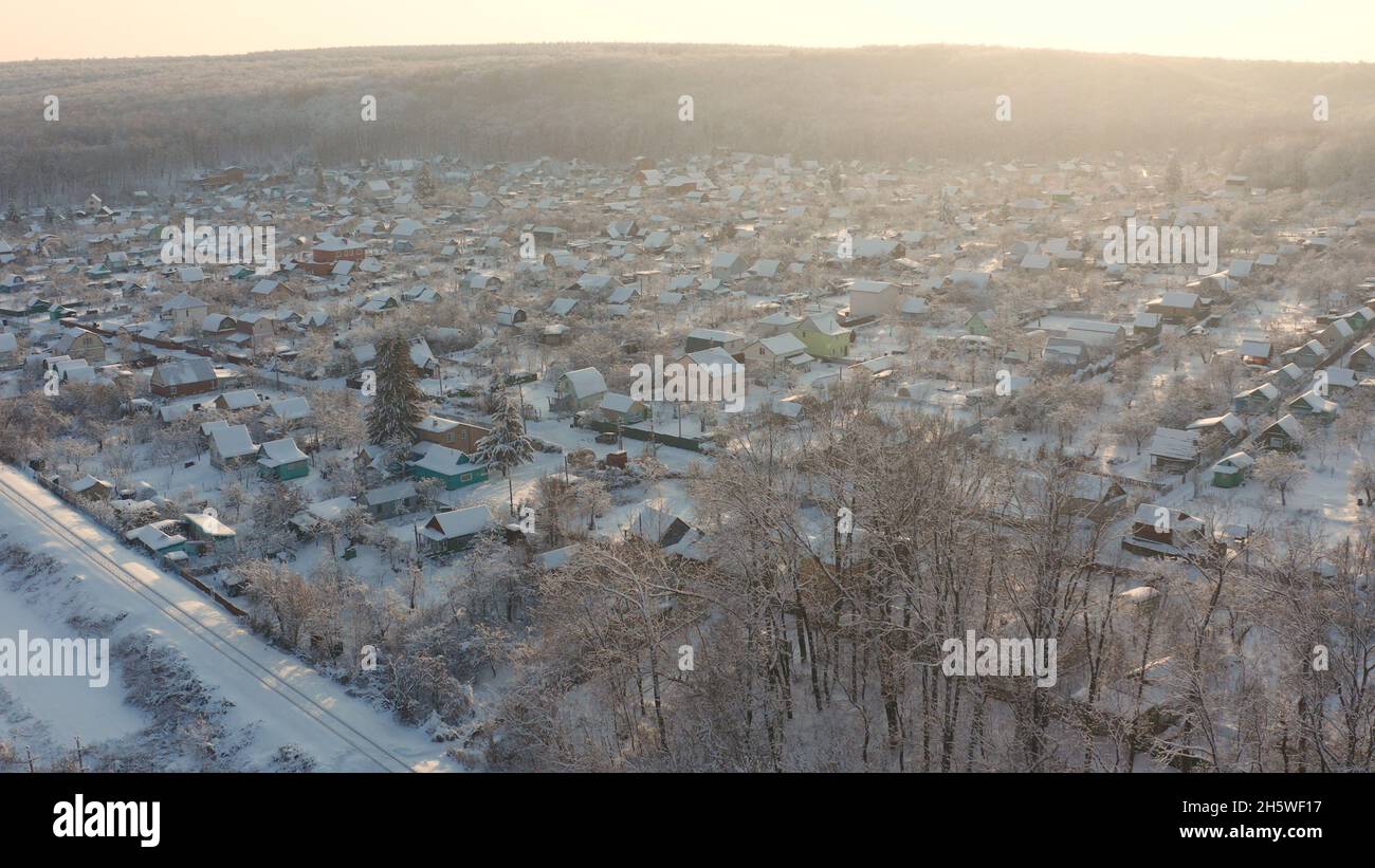 Snowy village in Russia. Winter country landscape with timber fence and ...