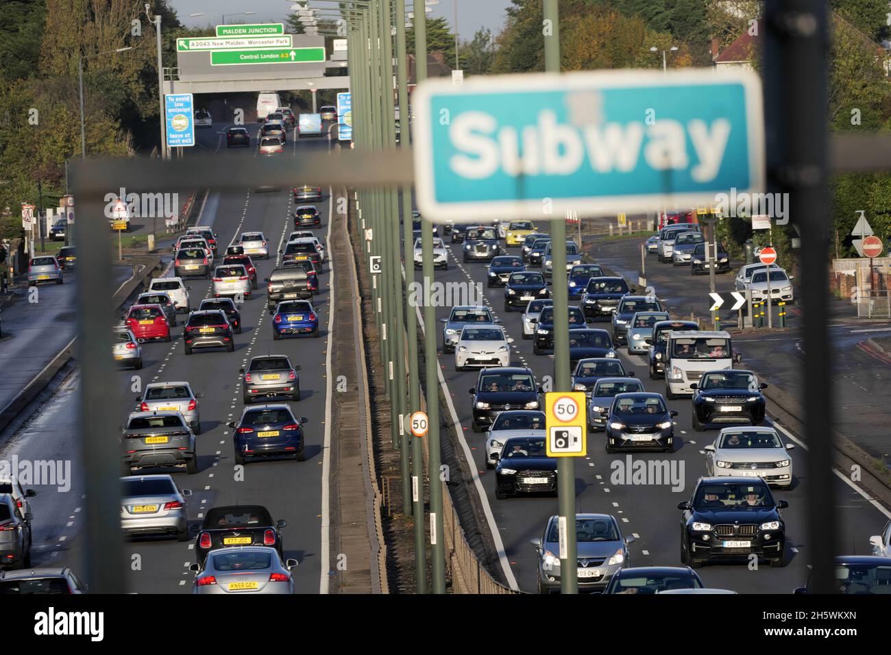Heavy traffic on the A3 Bypass heading towards New Malden and Tolworth on a bright and dry late afternoon. Stock Photo