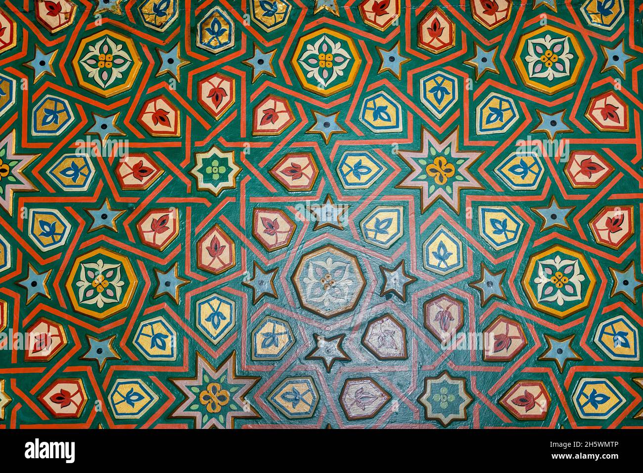 multicolored pattern on wood in arabic style for background or texture. Stock Photo