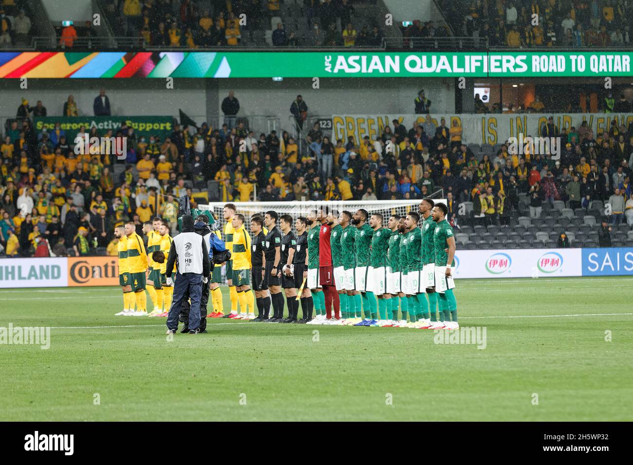 Sydney, Australia. 11th Nov, 2021. Both teams wait to sing the national anthem during the FIFA World Cup AFC Asian Qualifier match between the Australia Socceroos and Saudi Arabia at CommBank Stadium on November 11, 2021 in Sydney, Australia Credit: IOIO IMAGES/Alamy Live News Stock Photo