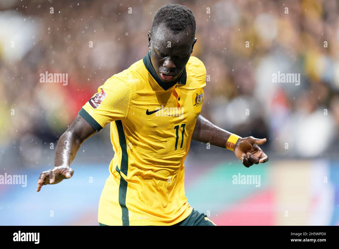 Sydney, Australia. 11th Nov, 2021. AWER MABIL of Australia controls the ball during the FIFA World Cup AFC Asian Qualifier match between the Australia Socceroos and Saudi Arabia at CommBank Stadium on November 11, 2021 in Sydney, Australia Credit: IOIO IMAGES/Alamy Live News Stock Photo