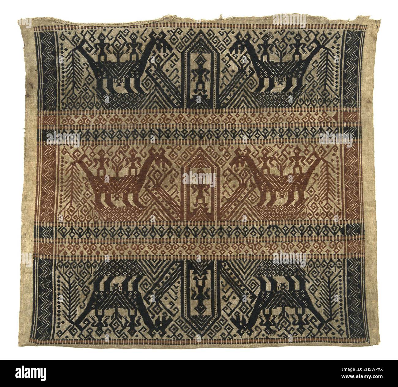 Ceremonial textile, C19th, Lampung, Sumatra. Tampan were used for rites of passage ceremonies, as the focal point for ritual meals, the seat for elders overseeing traditional law, and tied to newly-built houses. Examples from the mountainous interior show stylised natural or domestic subjects and geometric designs, while those from the coast (tampan pasisir) display richly detailed scenes of ships and other motifs. The ship, the main motif, symbolises movement, appropriate to the rites of passage rituals. Stock Photo