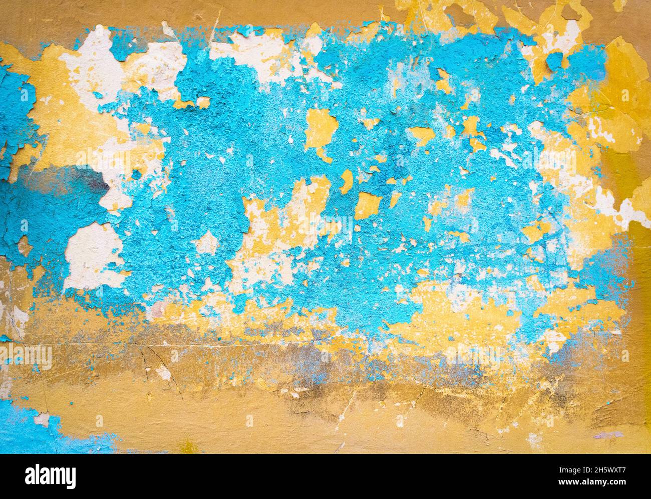 Abstract painted old cracked weathered cement wall background texture Stock Photo