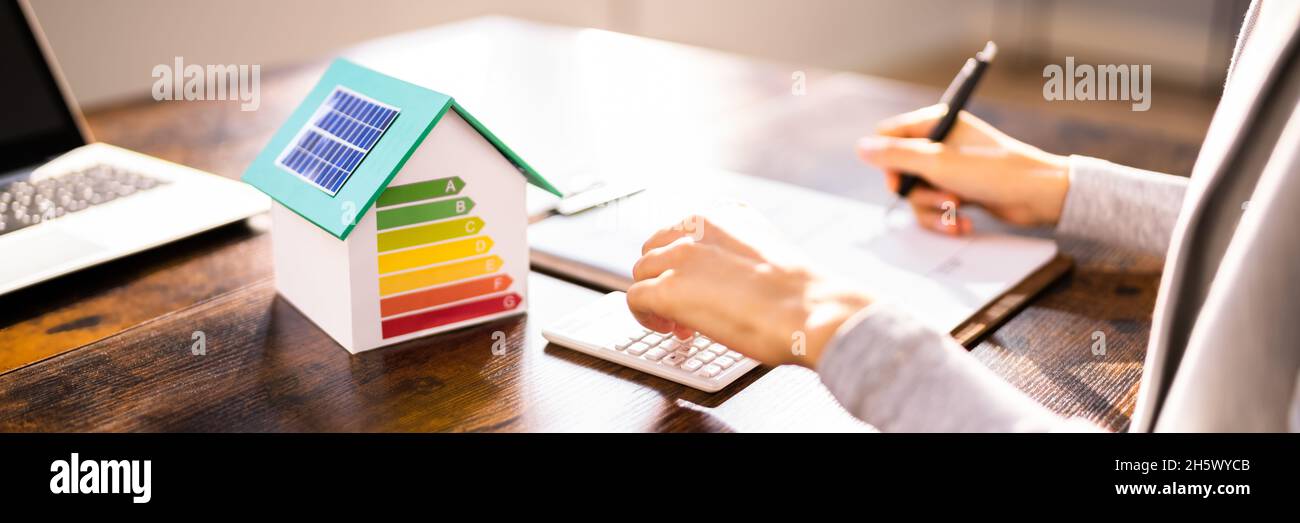 Energy Efficient House Calculator. Insulation Rate Audit Stock Photo