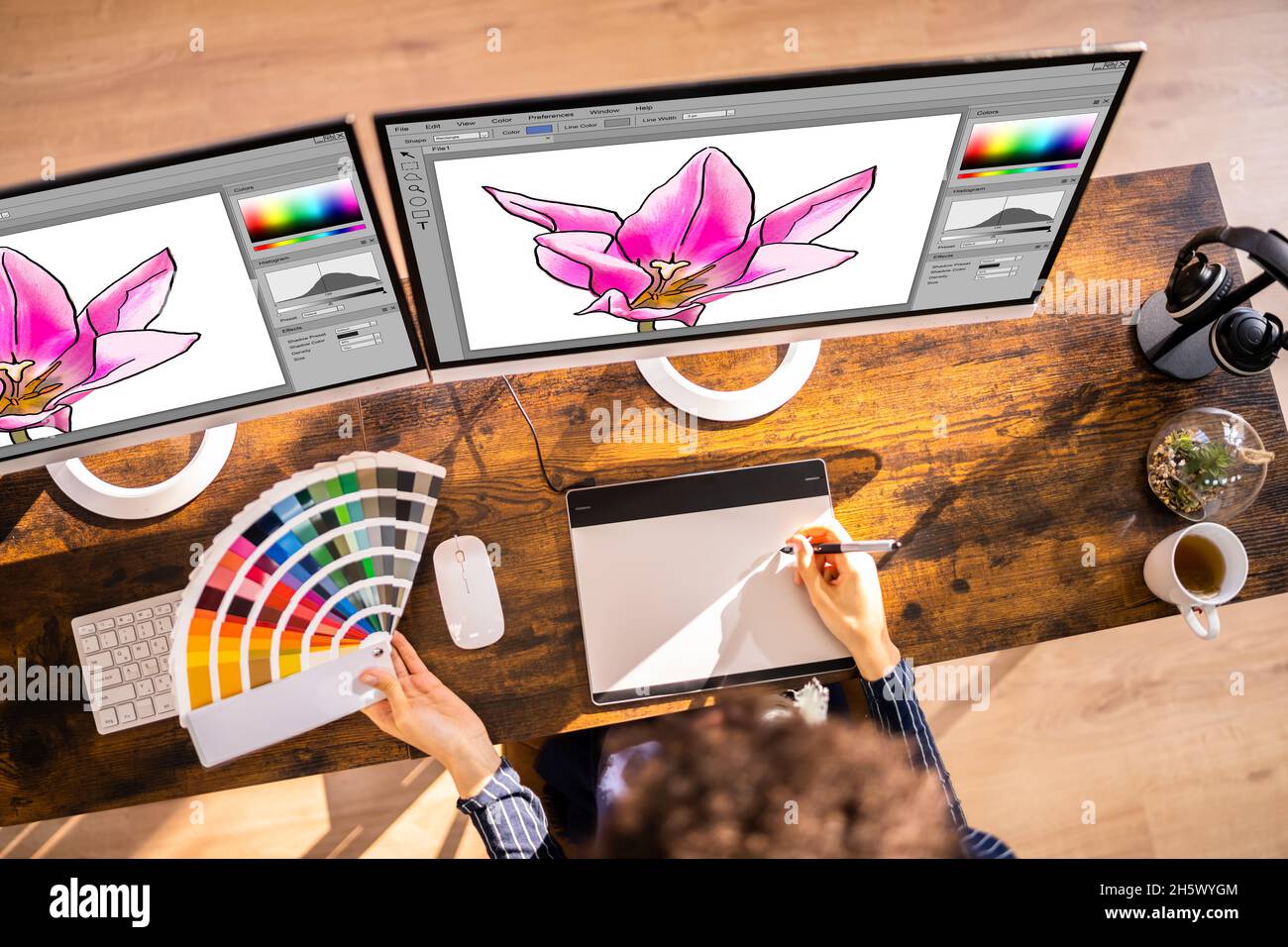 Graphic Designer Artist Working On Multiple Computer Screens Stock