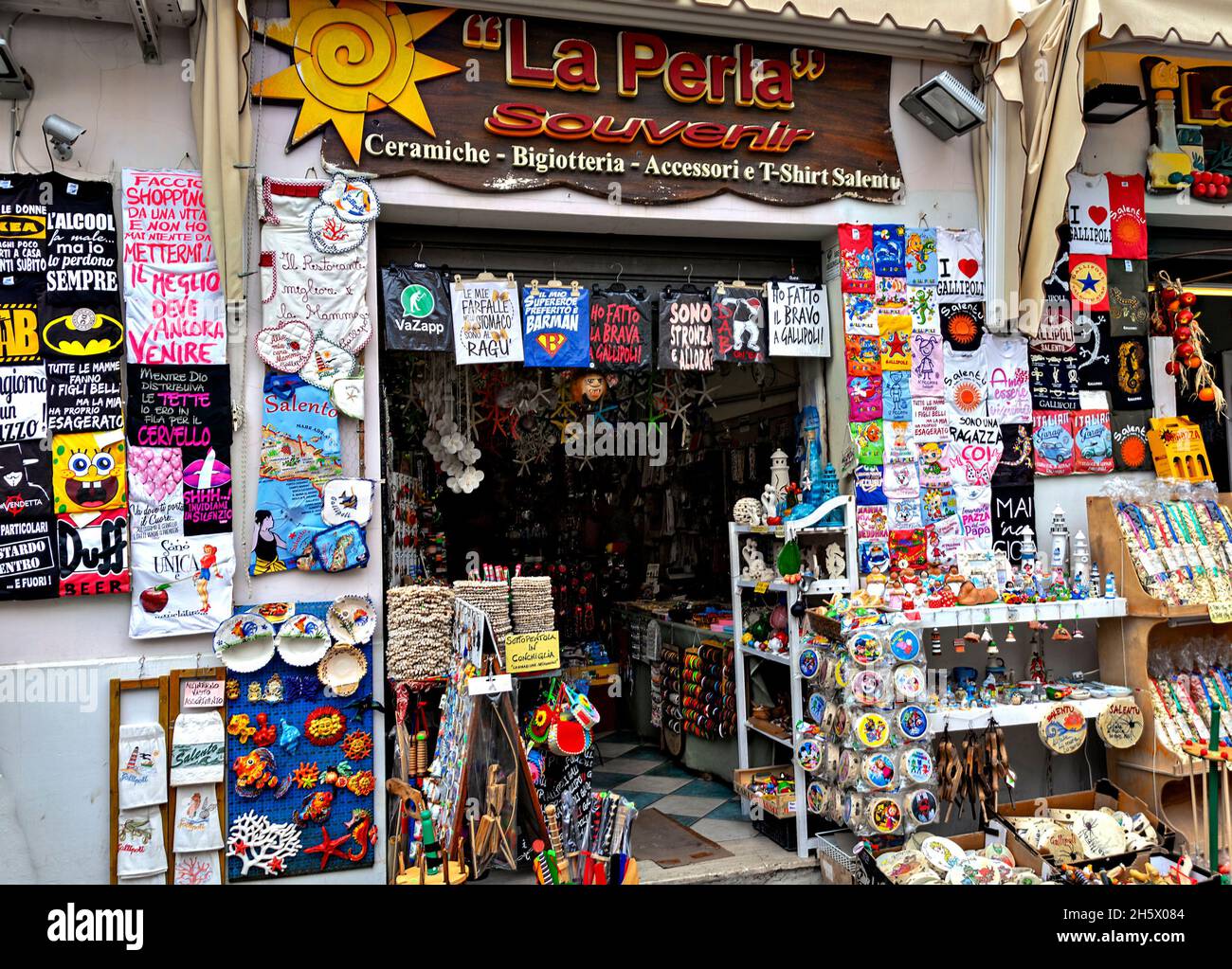 street shop with cheap souvenir goods for tourists in Gallipoli, Italy Stock Photo