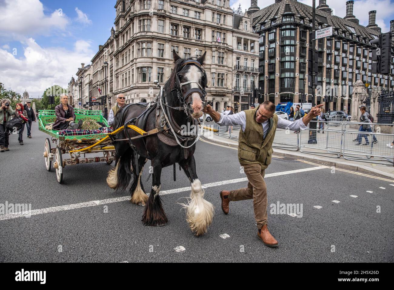 Romany Gypsies and Irish Travellers come together in Parliament Square to protest against a Police Bill which threatens their way of traditional life. Stock Photo