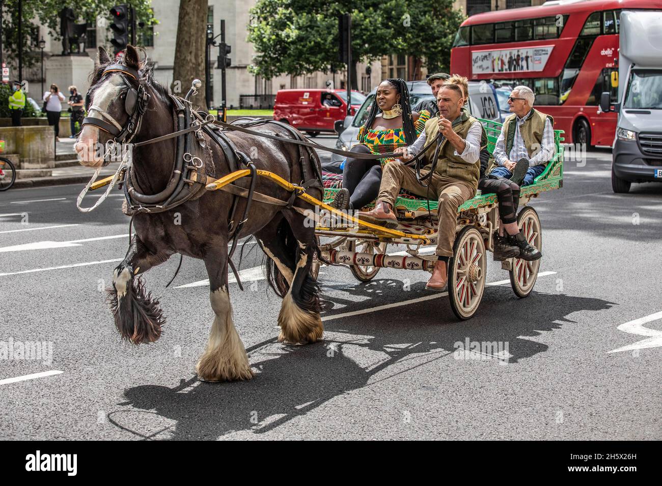 Romany Gypsies and Irish Travellers come together in Parliament Square to protest against a Police Bill which threatens their way of traditional life. Stock Photo
